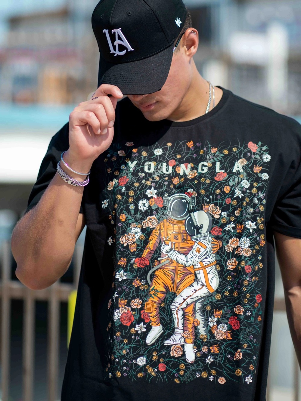 YoungLA Black Graphic Tee with Astronaut Floral Print size M